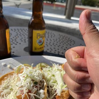 Rubio's Coastal Grill - Thumb's ABOVE the food and keeps ascending my hand's about to fly away.  The Pacifico, throw back to my vacay Beach spots. - Mexican Near Me - San Diego, California