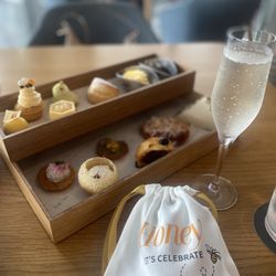 Bellini Bar - Tiered afternoon tea dishes and champagne with gifted honey