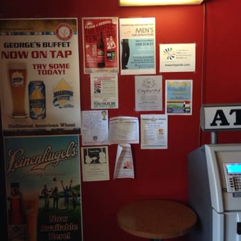 George's Buffet - an atm machine and a table - Dive Bars Near Me - Iowa City, Iowa