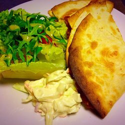 Grapevine - Spicy pinto bean quesadilla with dressed side salad & coleslaw