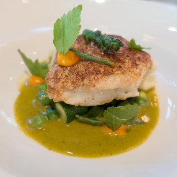 Laurie Raphaël - Crusted halibut filet with cucumbers and peas in a foresty "Nordique" pesto. - French Near Me - Quebec City, Quebec Laurie Raphaël - Crusted halibut filet with cucumbers and peas in a foresty "Nordique" pesto. - French Near Me - Quebec City, Quebec