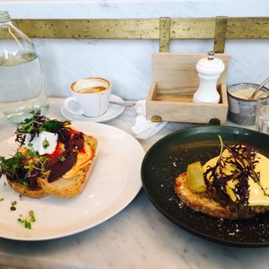 Photo of The Kettle Black - South Melbourne Victoria, Australia. Cured kangaroo with chilli scrambled eggs and pulled pork, poached eggs, pear and hollandaise sauce.