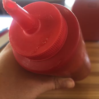 Phil's Icehouse - Ketchup bottles with dried ketchup all over them - Burgers Near Me - Austin, Texas Phil's Icehouse - Ketchup bottles with dried ketchup all over them - Burgers Near Me - Austin, Texas