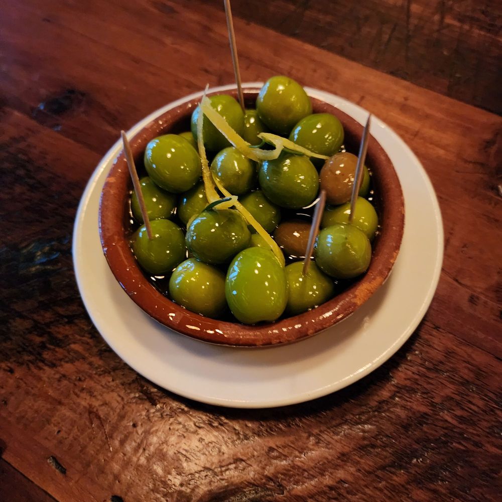 Salumi Tapas & Wine Bar - Warm olives - Italian Near Me - Massapequa, New York Salumi Tapas & Wine Bar - Warm olives - Italian Near Me - Massapequa, New York