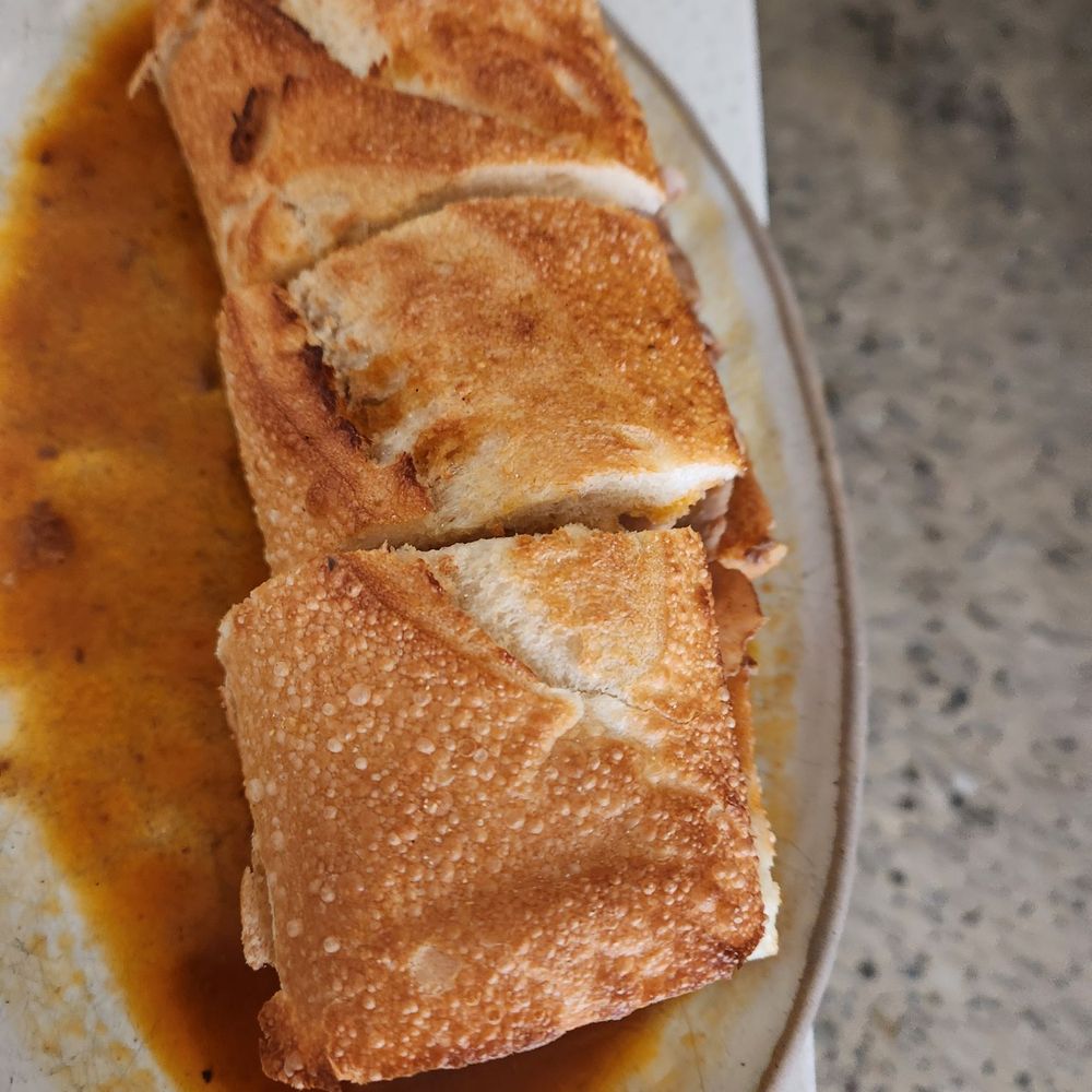 Lita - The Pork sandwich presentation- good for 2 to share - Portuguese Near Me - Aberdeen Township, New Jersey Lita - The Pork sandwich presentation- good for 2 to share - Portuguese Near Me - Aberdeen Township, New Jersey