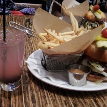 Relish Burger Bistro - Huckleberry cocktail, burger and fries - New American Near Me - Seattle, Washington