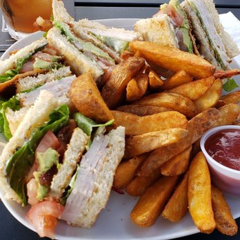 Bloom's Irish Pub - Yummy club sandwich with potato fries. - Irish Pub Near Me - San Clemente, California