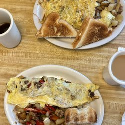Philly Cheese Steak Omelette (bottom) and Burger Omelette (top)