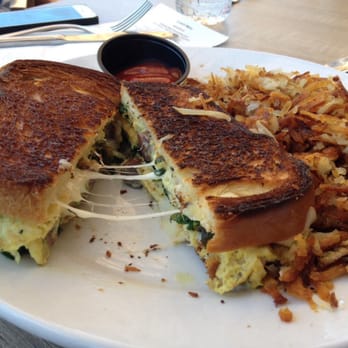 Shorehouse Kitchen - Breakfast grilled cheese sandwich - eggs, cheese, sausage, & spinach on toasted sourdough. Yum! - Coffee & Tea Near Me - La Jolla, California