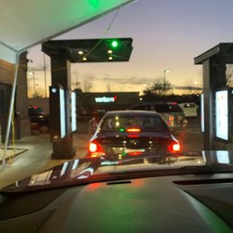 ows a car at a gas station