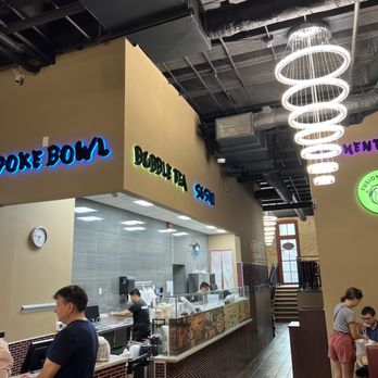 Fusion Poke - customers at the counter of a poke bowl restaurant - Ramen Near Me - Milwaukee, Wisconsin Fusion Poke - customers at the counter of a poke bowl restaurant - Ramen Near Me - Milwaukee, Wisconsin