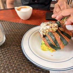 Boulder Cafe - Hot cappuccino and pistachio croissant