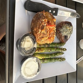 Sundowners - Filet with asparagus and loaded bake potatoes. - Seafood Near Me - Key Largo, Florida Sundowners - Filet with asparagus and loaded bake potatoes. - Seafood Near Me - Key Largo, Florida