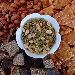 Mama Monacelli’s Kitchen - Pictured here is our glazed almonds, peanut brittle, English toffee and our ginger nut mix.