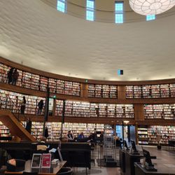 Stockholms Stadsbibliotek - All these magnificent books. There is a walkway by the upper windows.  Couldn't find it.