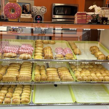 Smiling Donut - Breakfast case with sandwich and kolache options - Donuts Near Me - Hutto, Texas