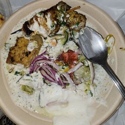 Pita Bistro - Can't even see the hummus under this soup of tziki sauce. Kickin K Bob Bowl.