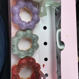 Taro, black sesame and red velvet Japanese mochi donuts. Taro, black sesame and red velvet Japanese mochi donuts.