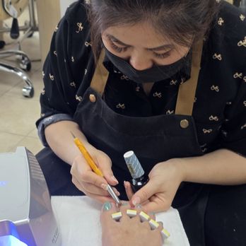 Unique Nails - Lisa designing my toes - Nail Salons Near Me - Desert Hot Springs, California Unique Nails - Lisa designing my toes - Nail Salons Near Me - Desert Hot Springs, California