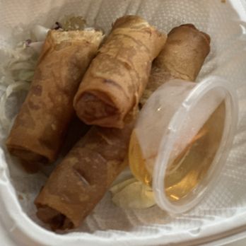 Simple Joy Vegetarian Cuisine - Crispy veggie egg rolls. Pricey for 2 cut egg rolls. - New American Near Me - Honolulu, Hawaii