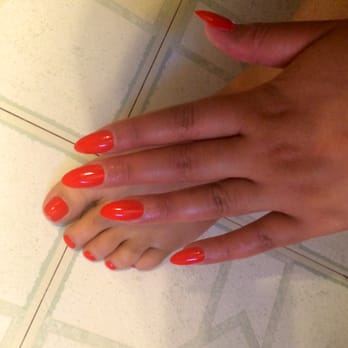 Bella Nails - Full acrylic set & pedi. Color is Tasmanian Devil Made Me Do It by O.P.I. - Nail Salons Near Me - West Milwaukee, Wisconsin