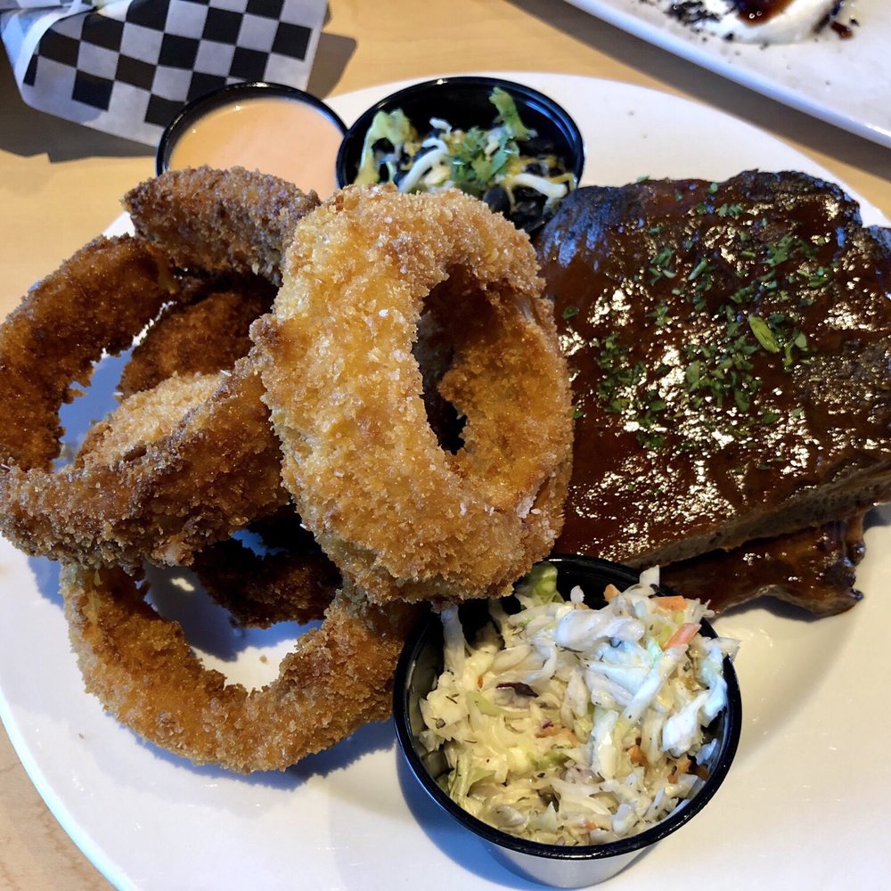 Garage Grill - Onion rings were almost as big as a half rack of ribs. Way too much breading. Scale back the breading and less quantity. - New American Near Me - Draper, Utah Garage Grill - Onion rings were almost as big as a half rack of ribs. Way too much breading. Scale back the breading and less quantity. - New American Near Me - Draper, Utah