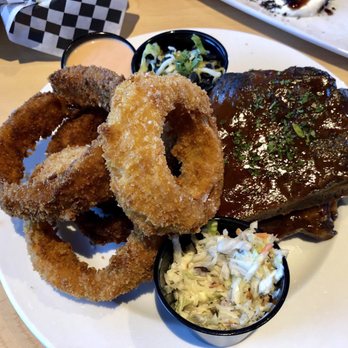 Garage Grill - Onion rings were almost as big as a half rack of ribs. Way too much breading. Scale back the breading and less quantity. - New American Near Me - Draper, Utah Garage Grill - Onion rings were almost as big as a half rack of ribs. Way too much breading. Scale back the breading and less quantity. - New American Near Me - Draper, Utah
