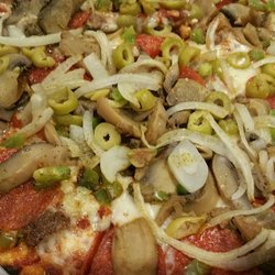 Dan's Pizza - Deluxe, lots of toppings and crispy crust