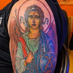 Fat Ram's Pumpkin Tattoo - This is the photo of the tattoo of st. Raphael that Esben completed today.