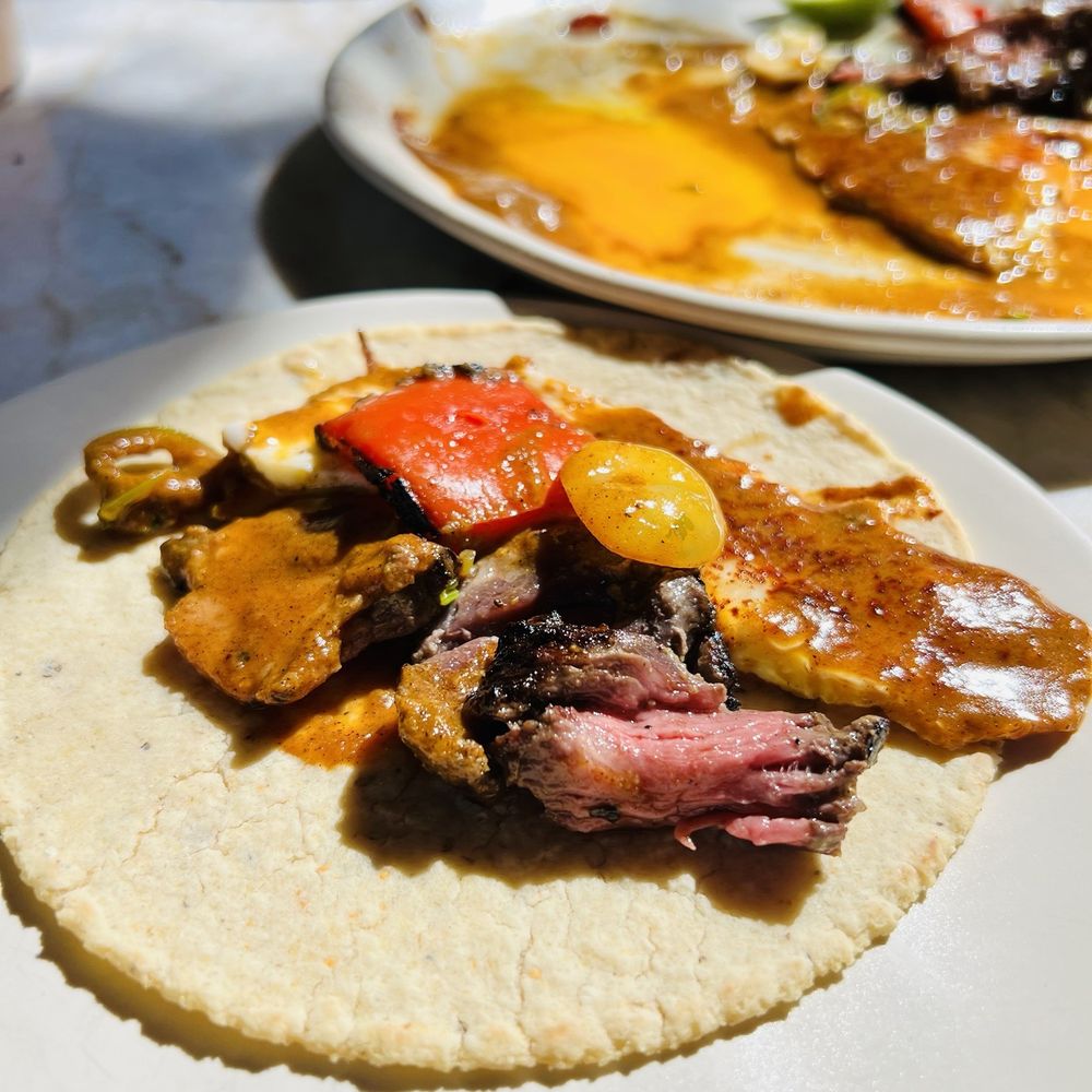 Este - Alambre & eggs are Steak & eggs, our most loved dish.  Steak on skewer was so tender & juicy! - Seafood Near Me - Austin, Texas