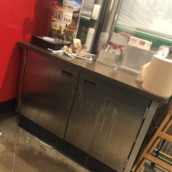 Wingstop - More garbage and just filth as well as a mysterious white goo - Chicken Wings Near Me - Aurora, Illinois
