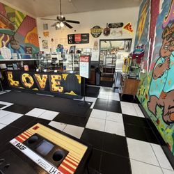 Hella Pie Pizza - Wide angle shot of the restaurant from the couch against the front window.