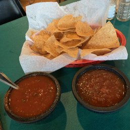 Warm chips and mild salsa and hot salsa. Warm chips and mild salsa and hot salsa.
