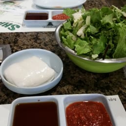 Fresh green salad with white rice wrap and more coming side dish can't wait Fresh green salad with white rice wrap and more coming side dish can't wait