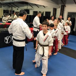 Congratulating the students who passed their belt exam Congratulating the students who passed their belt exam