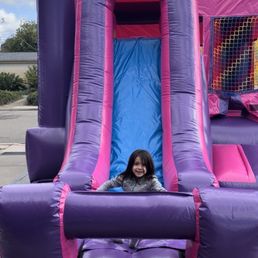 Child on jumper slide Child on jumper slide