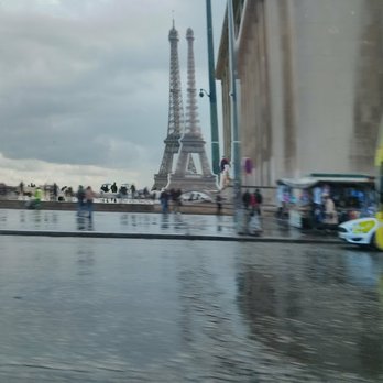 La Seine - Paris - No, Tour Eiffel didn't duplicate itself, but with the rain on the Seine, it looks like it may have. - Landmarks & Historical Buildings Near Me