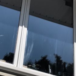 Patriot Pressure Washing - Outside view; poor attempt to clean outside of my windows. This was marks left with the tool that ruined my window
