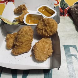 McDonald's - Dried out nuggets. They appear to be old because it was tough to chew and dry . At least the sauce was good .