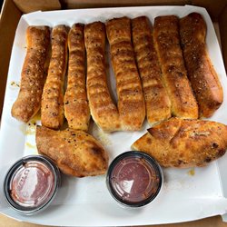 Papa Johns Pizza - Parmesan garlic butter bread sticks with marinara dipping sauce was so good.