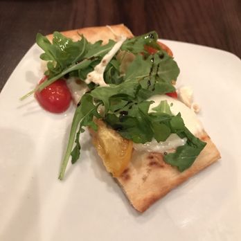 Juniper Bar - The flatbread appetizer (one of 6 pieces) - Cocktail Bars Near Me - New York, New York Juniper Bar - The flatbread appetizer (one of 6 pieces) - Cocktail Bars Near Me - New York, New York