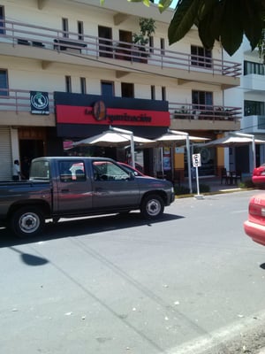 La Organización & Organic Coffee - Sucursal Heroica by null