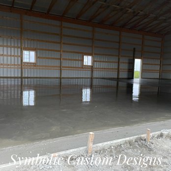 Symbolic Custom Designs - Shop concrete floor installation machine finished for a smooth and shiny surface - Masonry/Concrete Near Me - Richmond, Missouri Symbolic Custom Designs - Shop concrete floor installation machine finished for a smooth and shiny surface - Masonry/Concrete Near Me - Richmond, Missouri