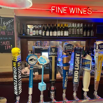 Grassfields Food & Spirit - a row of beer taps - American Near Me - Waltham, Massachusetts Grassfields Food & Spirit - a row of beer taps - American Near Me - Waltham, Massachusetts