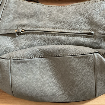 Martinizing Dry Cleaning - Before, notice leather around pocket zipper. - Dry Cleaning Near Me - Thornton, Colorado Martinizing Dry Cleaning - Before, notice leather around pocket zipper. - Dry Cleaning Near Me - Thornton, Colorado
