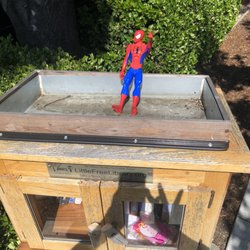 Little Free Library - Just restocked book selection. Cute Spiderman addition