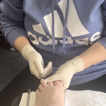 Dahlia Nails & Spa - Holding my toe so I don't see it bleeding. - Nail Salons Near Me - Astoria, New York Dahlia Nails & Spa - Holding my toe so I don't see it bleeding. - Nail Salons Near Me - Astoria, New York