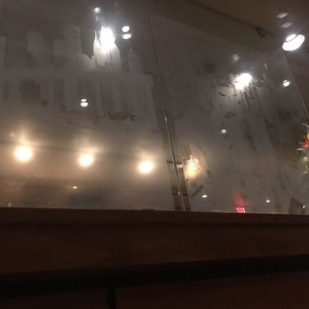 Skylines Cafe - Skyline on the glass between dining and the bar - New American Near Me - Clayton, North Carolina