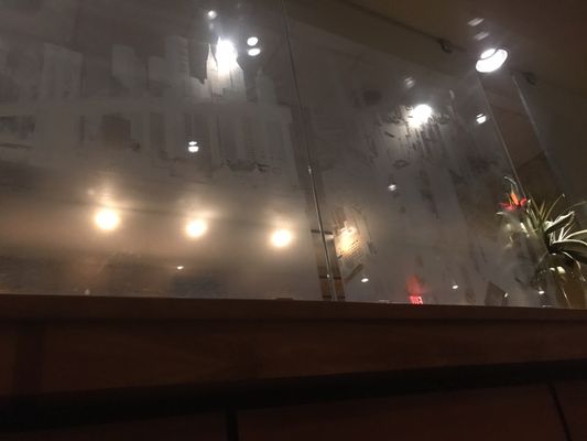 Photo of Skylines Cafe - Clayton, NC, US. Skyline on the glass between dining and the bar