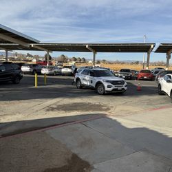Covered 6 - Parked sideways in a "No Parking Zone" in the school's parking lot.